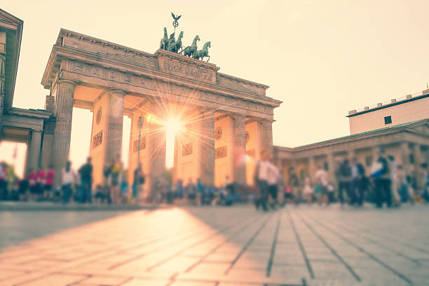 istock summer afternoon at Brandenburger Tor Berlin with sunlight - crossprocessed 514506696