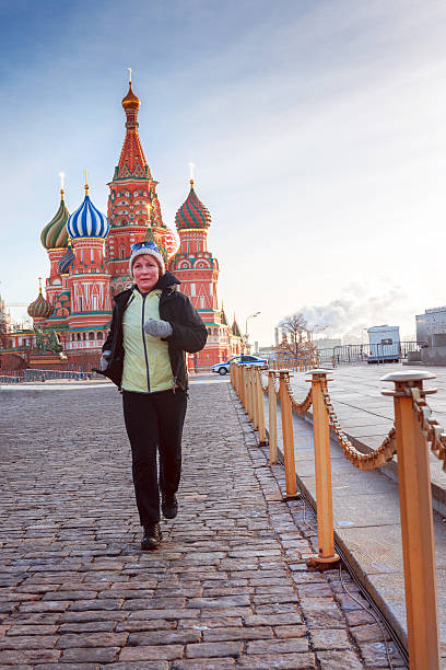 istock Active Mature Woman Running, St Basils Cathedral, Moscow, Russia 514509000