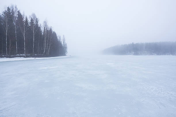 istock Thick fog at frozen lake landscape 514510044