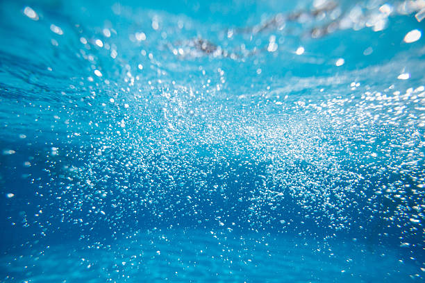 istock bubbles of water on blue background 514511156