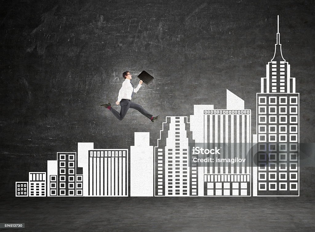 Career ladder Businessman climbing up white stairs in shape of New York buildings to Empire State Building. Black background. Concept of career growth. Achievement Stock Photo