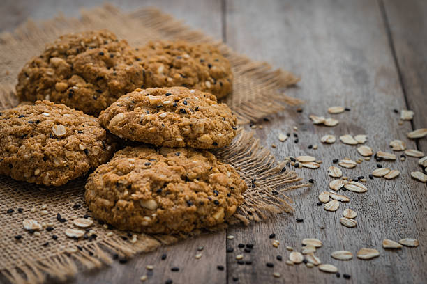 istock Oatmeal cookies with sesame seeds on sackcloth 514515812