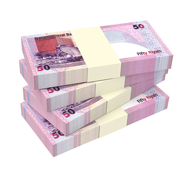 istock Qatar riyal bills isolated on white background. 514518052