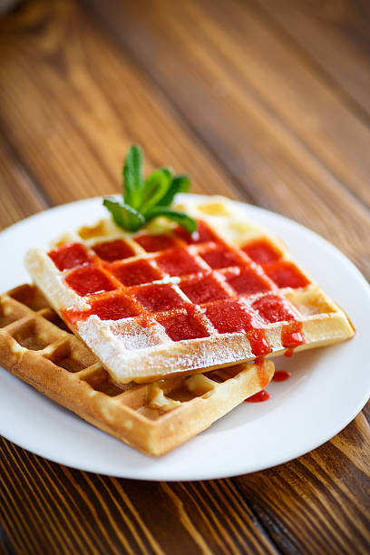 istock Viennese sweet waffles with strawberry jam 514518234