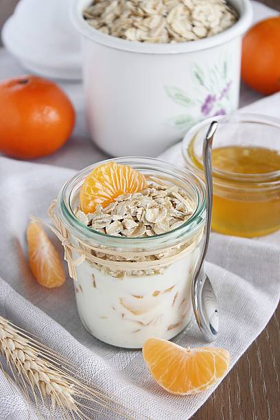 istock Granola with yogurt,mandarin and honey. 514519423