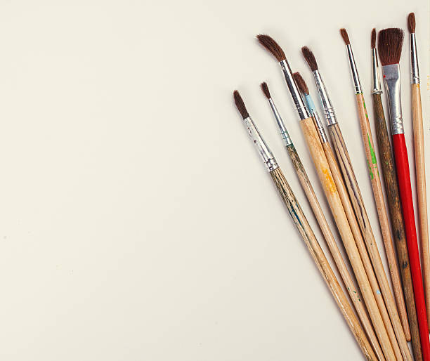 istock brushes for painting  and blank white paper sheet 514520630