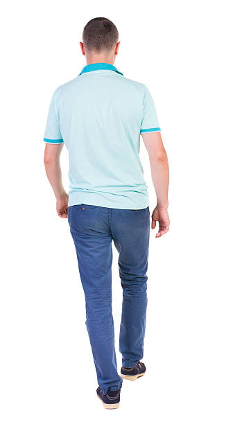 istock Back view of going  handsome man in jeans 514530671
