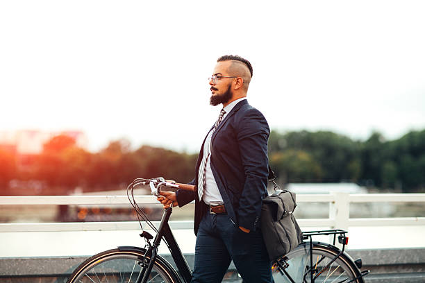 istock Businessman Push Bicycle Outdoors. 514557616