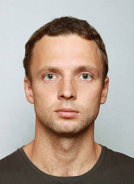 istock Young Caucasian man closeup portrait. Headshot on gray 514558929