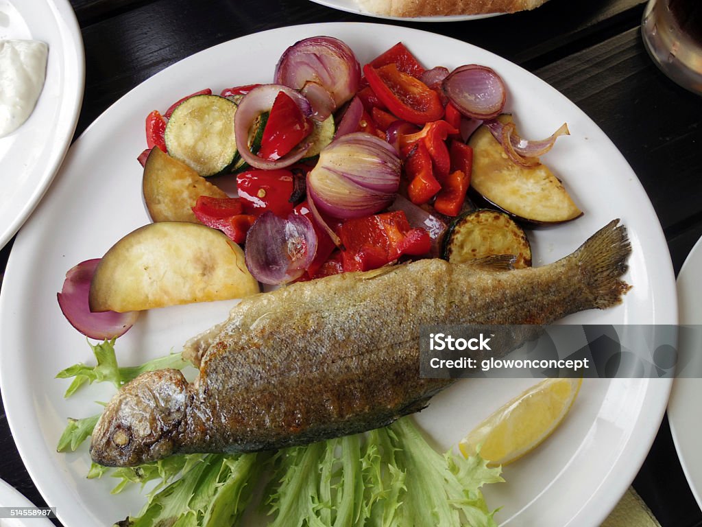 grill trout steak with vegetable grill lake trout steak with vegetable Crockery Stock Photo