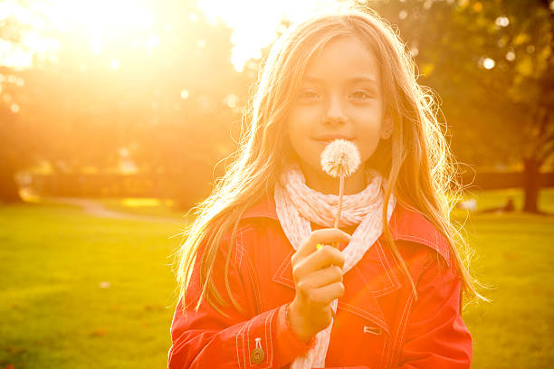 istock Cute girl in a park. 514559365