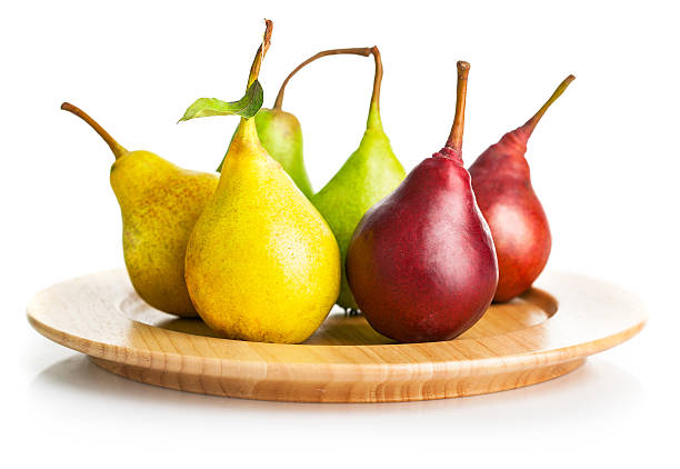istock fresh pears on the wooden plate 514559471