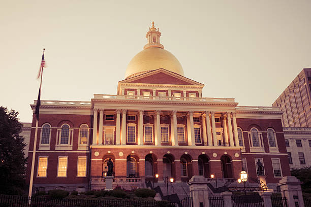 Massachusetts State House in Boston, MA at night.