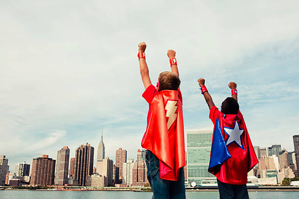 bohater manhattan - superhero child partnership teamwork zdjęcia i obrazy z banku zdjęć