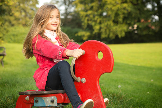 istock Cute girl in a park. 514560039