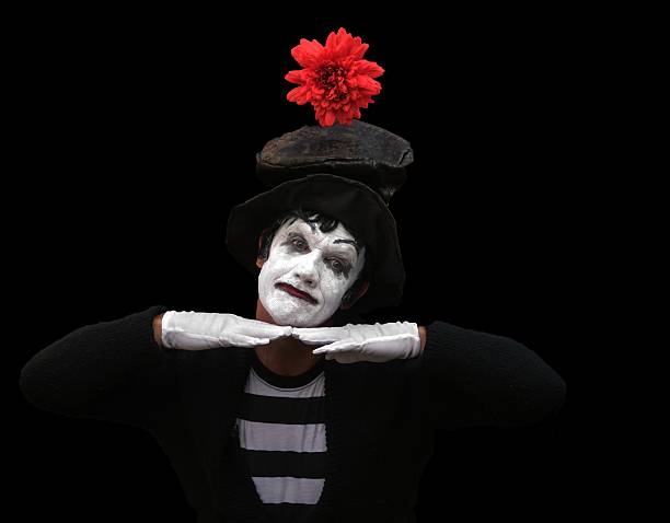 mime artist resting his chin on his hands