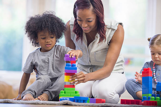 istock Preschoolers Building Block Towers 514561196