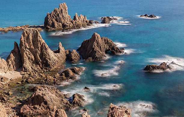 Sirens Reef Landscape in the Sirens Reef. Natural Park of Cabo de Gata. Spain. agua volcano photos stock pictures, royalty-free photos & images