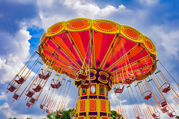 красочные аттракцион вихрь - carnival amusement park swing traditional festival стоковые фото и изображения