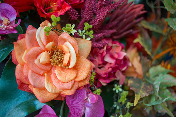 Colorful bouquet of artificial flowers with different blossoms
