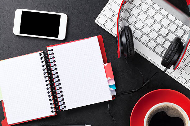 istock Office leather desk with notepad, smartphone and coffee cup 514563288