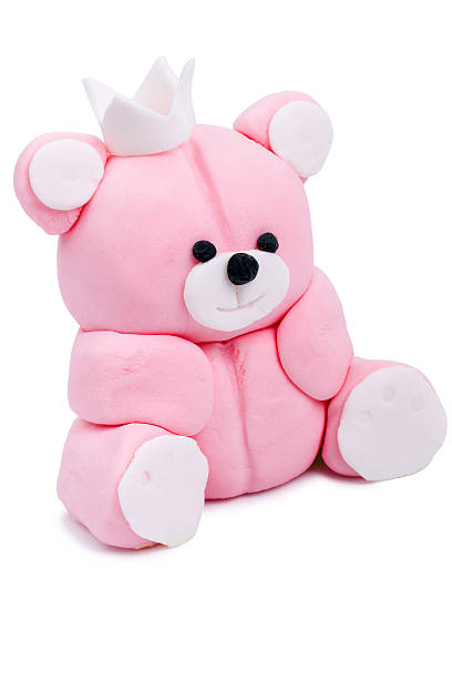 istock Pink bear from marzipan isolated on a white 514563582