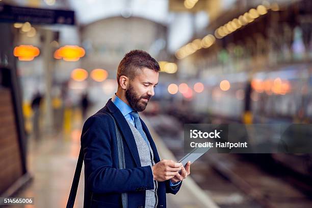 Hipster Businessman With Tablet Waiting Train Platform Stock Photo - Download Image Now