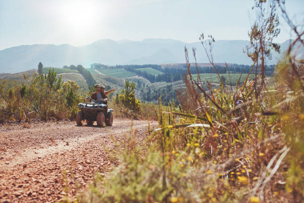 istock Young couple having fun on quad bike 514567952