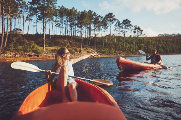 istock Young couple kayaking on the lake 514568468