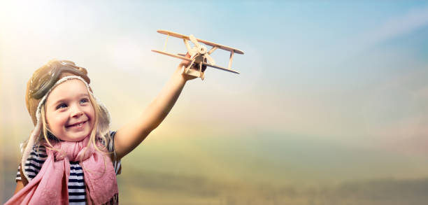 istock Freedom To Dream - Kid With Airplane 514569052