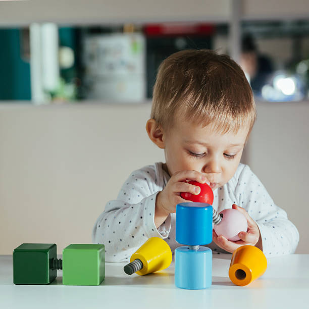 istock Little Boy Is Playing With Toys 514570824