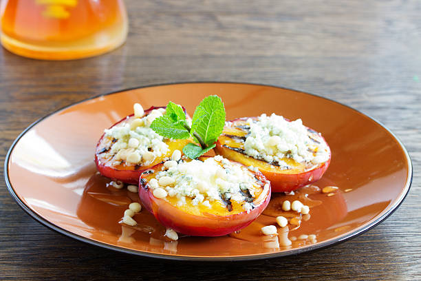 istock Grilled peaches with honey and gorgonzola. 514572526