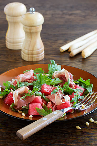istock Summer salad with water-melon and prosciutto. 514574220