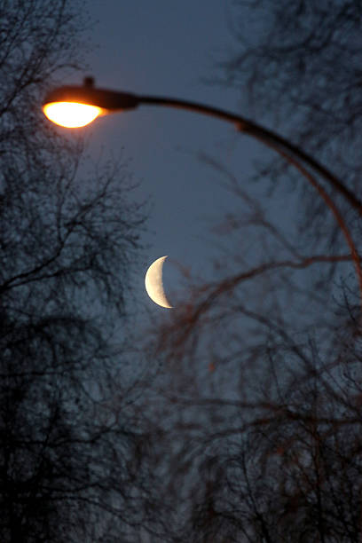street lamp and moon stock photo