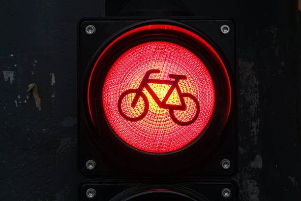 istock Red colored traffic light with bike sign for cyclists 514579870