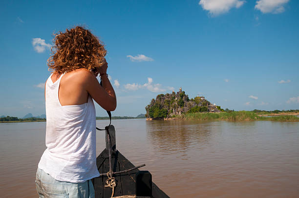 istock Female traveler exploring Burma's Thanlwin River 514580456