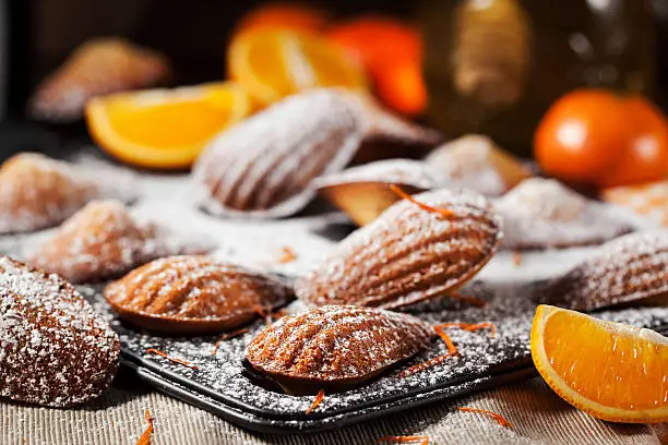 Fresh homemade orange and honey madeleines cookies