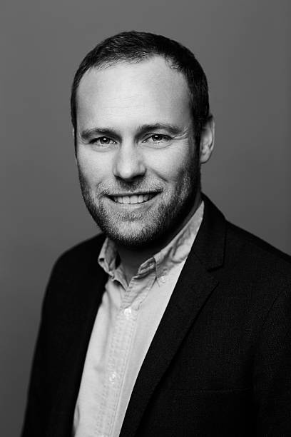 Black and white businessman portrait, smiling