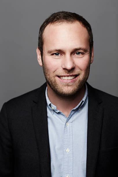 istock Confident businessman smiling at camera 514582530