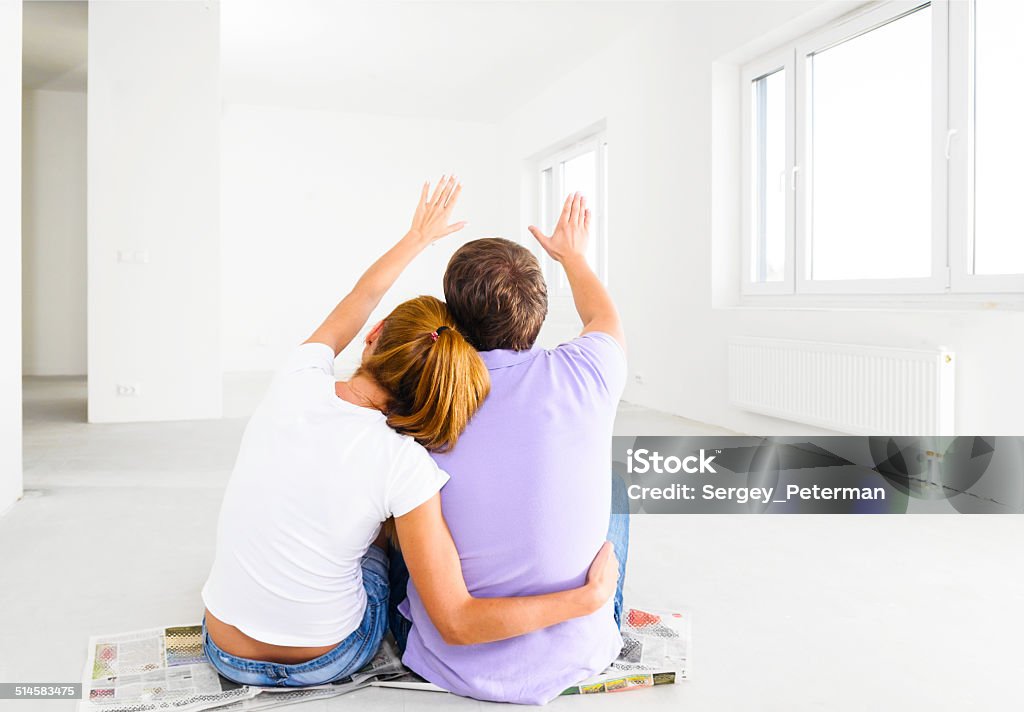 new apartment couple at their new empty apartment Adult Stock Photo
