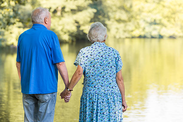 istock Senior couple  by the lake 514584129