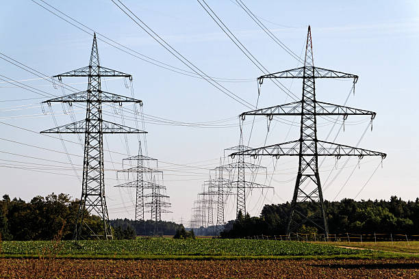 istock high voltage electric power poles 514584161