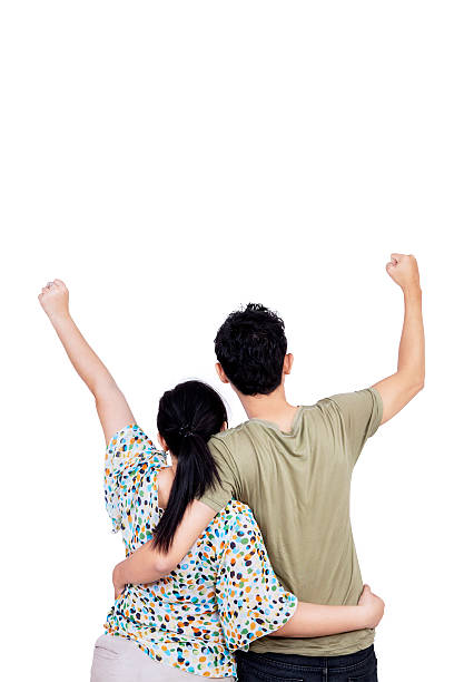 istock Back view of couple expressing success 514584289