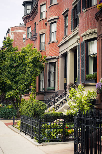 istock Residential structures along street in Boston, MA 514585495