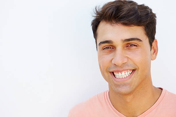 istock Portrait Of Young Man Standing By Wall 514589099