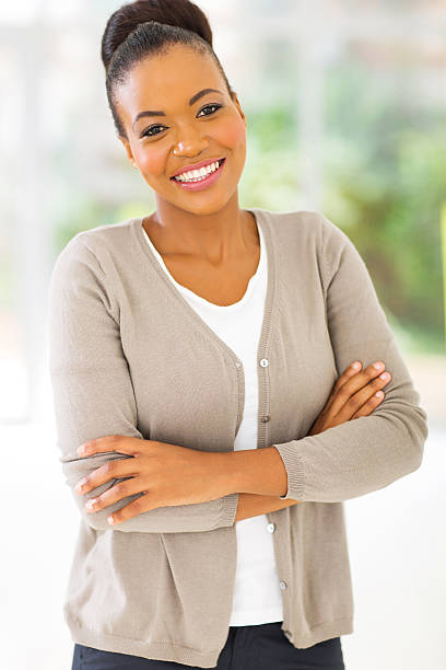 istock african businesswoman standing in office 514611127