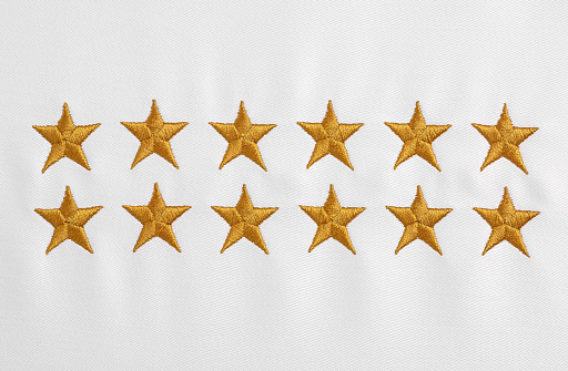 Stars embroidered on white cloth