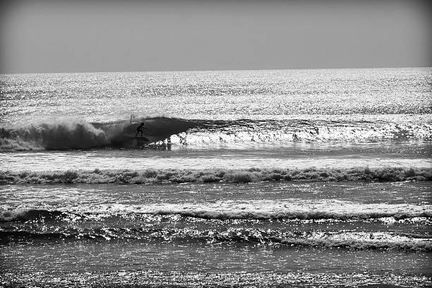 istock Surfer is riding a big wave in the ocean. 514612413
