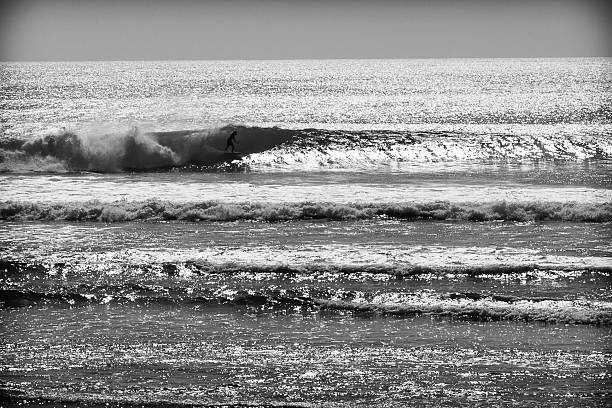 istock Surfer is riding a big wave in the ocean 514612415