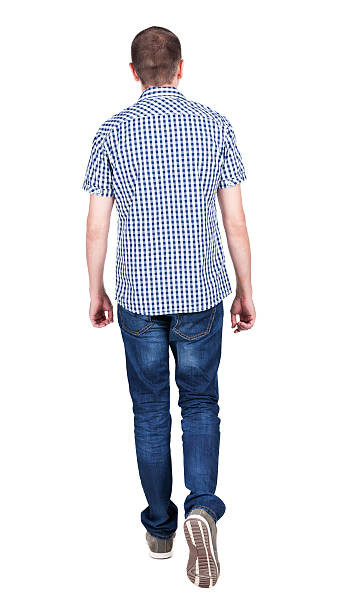 istock Back view of going  handsome man in jeans 514615711